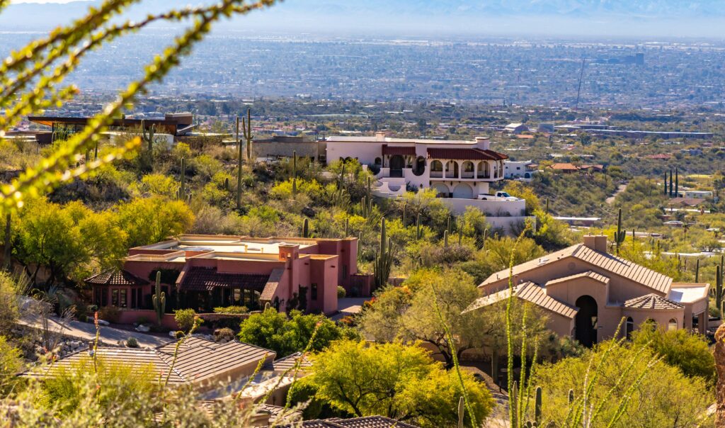 Desert hillside houses overlooking a city in Arizona.