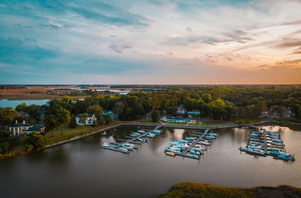 Aerial view of a private coastal residential neighborhood and boat marina in Savannah, Georgia.